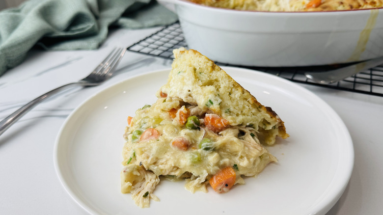 Creamy cheesy chicken cobbler serving on plate