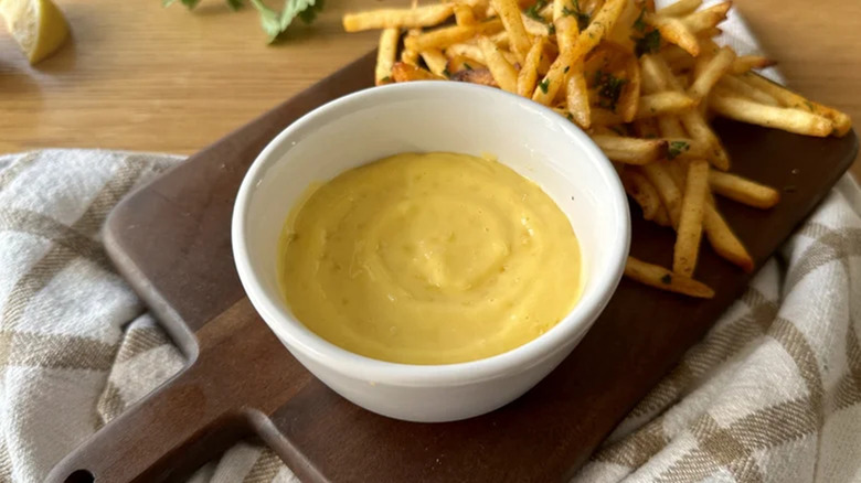 Homemade aioli in a bowl with fries