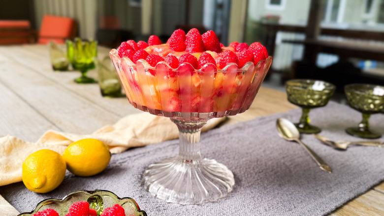 3-ingredient raspberry lemonade British trifle on table with lemons and berries