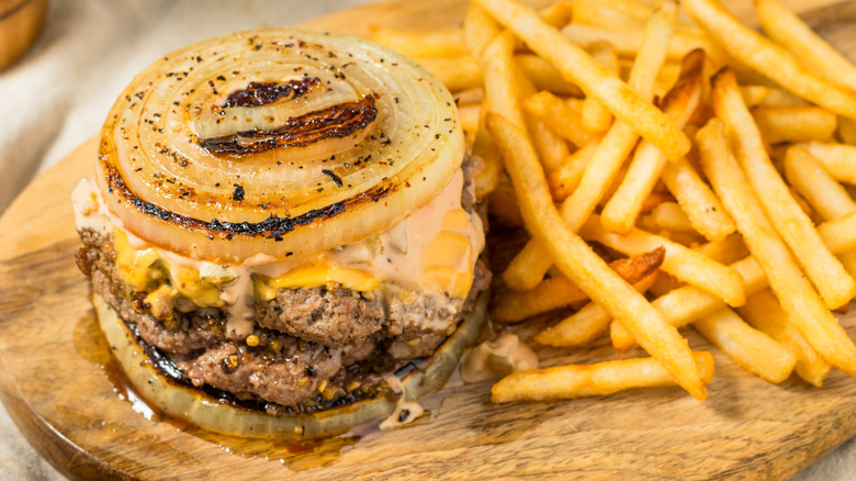 Onion-wrapped flying Dutchman burger and fries